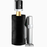 Coravin wine preservation system with black protective sleeve, needle, and silver handle for accessing wine without cork removal.