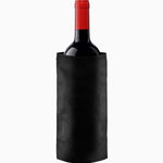 Red wine bottle partially covered by a black neoprene wine cooler, keeping it chilled and stylish.