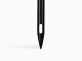 Close-up of a sleek black needle with a narrow eye and sharp pointed tip, set against a white background.