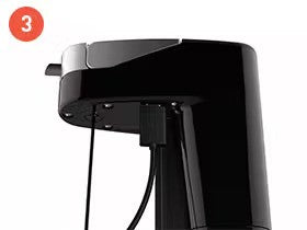 Close-up of a black appliance with a power cord, showing its sleek design and numbered step "3" in the corner.