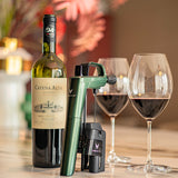 2020 Catena Alta Malbec wine bottle, Coravin wine preservation system, and two glasses of red wine on a marble surface.