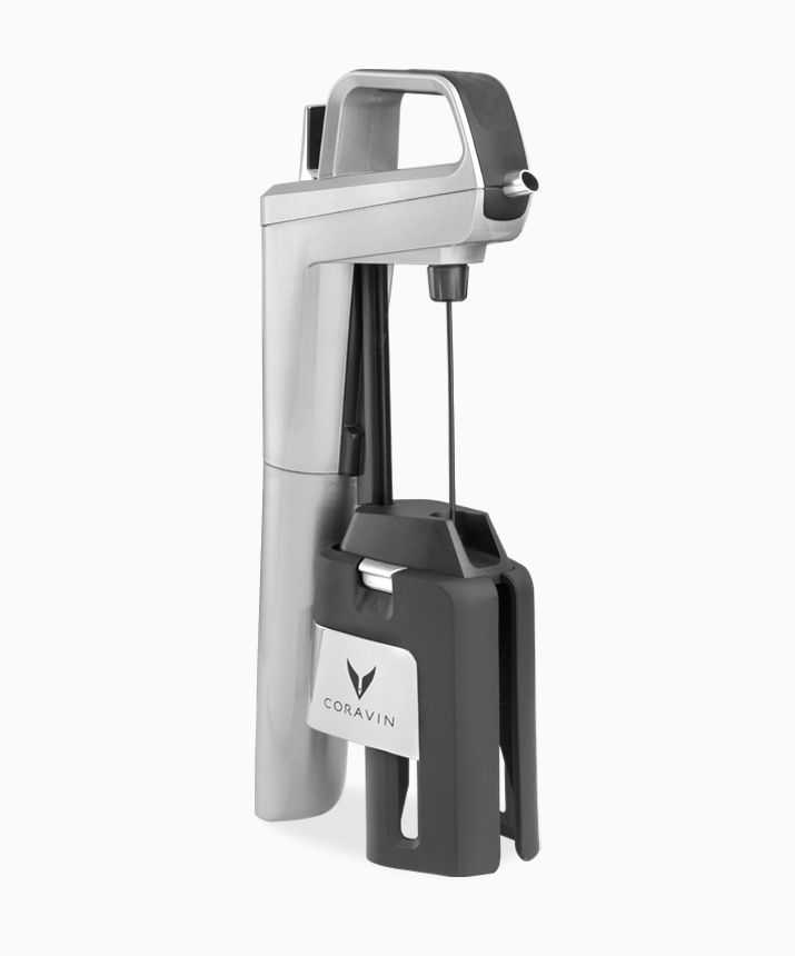 Coravin wine preservation system with a silver and black design, featuring a needle and lever mechanism.